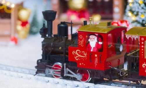 Toy train with Santa in a Christmas holiday display