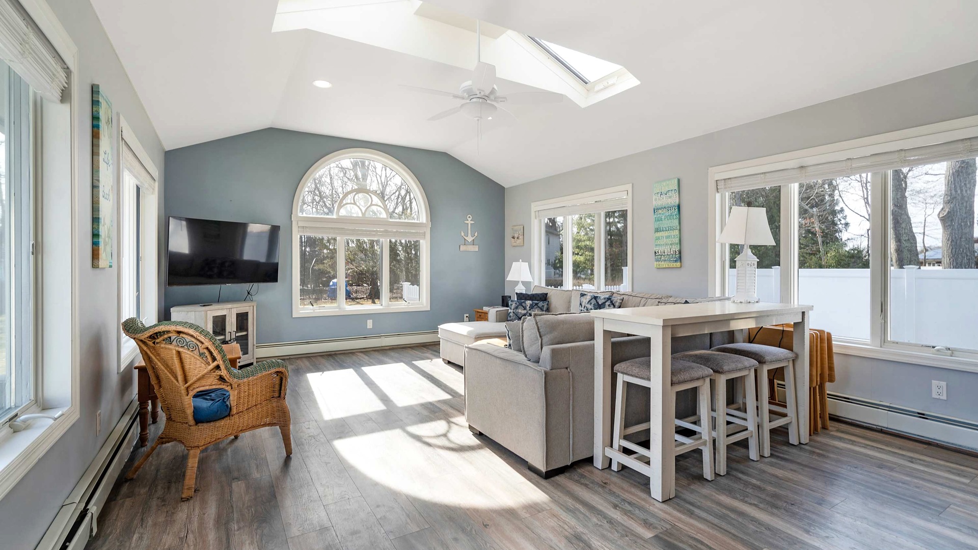 Bright living room at Poppy's Hampton House in Hampton Bays, NY