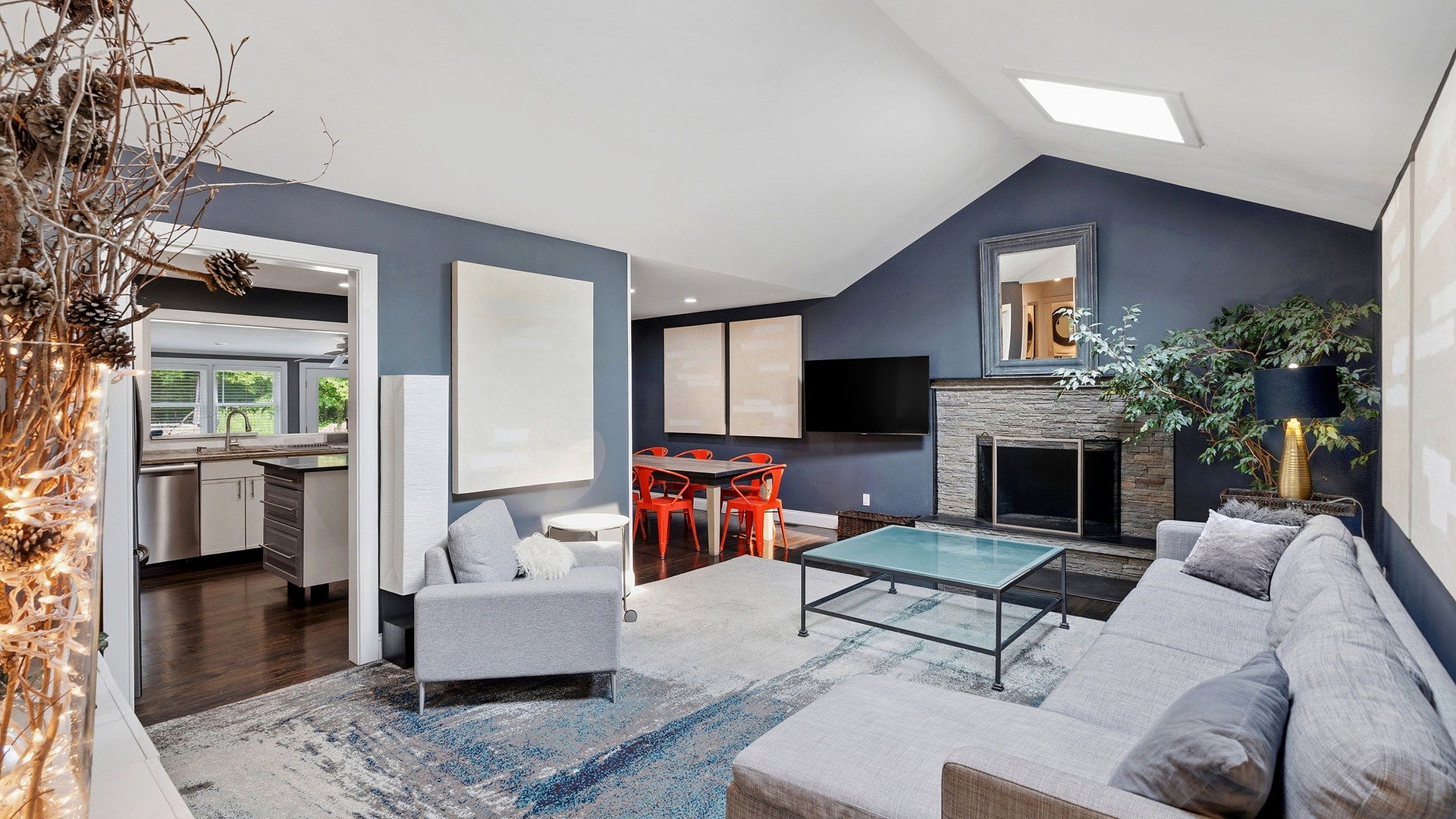 Living room with a fireplace at the Southampton Pool Home Near Village in Southampton, NY